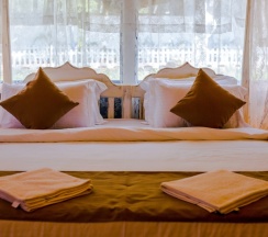 Двухместный коттедж двуспальная кровать в Hibis Hotels and Resorts