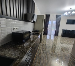 Семейный номер с кухней в У Маргариты