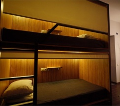 Кровать в 3-местном общем номере в Юсенги