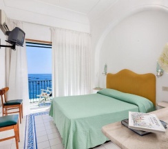Двухместный номер Standard с видом на море двуспальная кровать в Hotel Pupetto