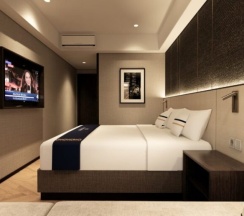 Двухместный номер Deluxe с видом на город 2 отдельные кровати в Fieris Hotel Rawamangun
