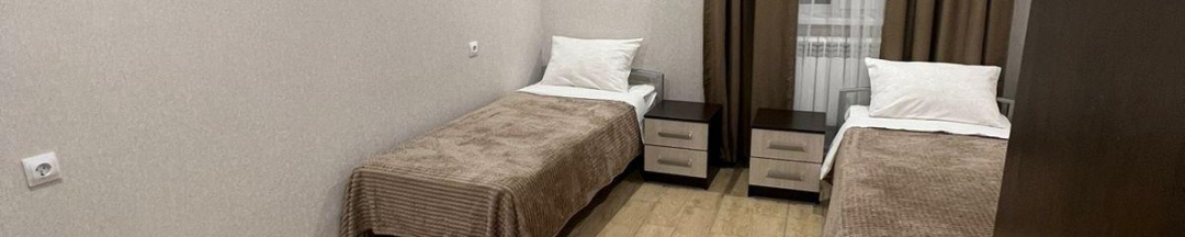 Кровать в 2-местном общем номере в Уют