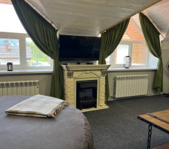 Двухуровневый люкс на мансарде в Шатун