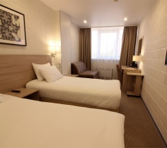 Номер Первой категории с двумя раздельными кроватями в Time