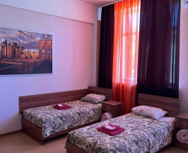 Кровать в 4-местном общем мужском номере в Восход