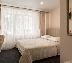 Улучшенный 2хместный номер с двумя кроватями в Albergo