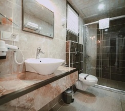 Апартаменты Comfort в Voswos Garage Coffee & Hotel