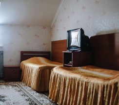Кровать в 4-местном общем номере в Ивановка