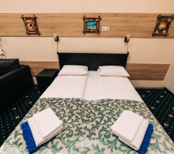 Семейный номер "Комфорт+" с кухней (№105) в Заря