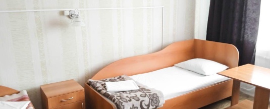 Кровать в 5-местном общем женском номере в Smart Hotel KDO Магнитогорск