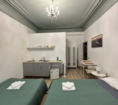 Четырёхместная комната с собственной мини - кухней для 4 взрослых / Quadruple room with private kitchenette в Pio