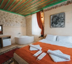 Двухместный люкс двуспальная кровать в La Casa Cave