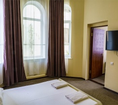 Номер стандарт семейный с 1 двуспальной кроватью в Оптима