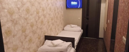 Кровать в 1-местном общем номере (без окна) в Элит