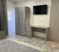 Двухместный номер Standard с балконом двуспальная кровать в Гостевой дом на Октябрьской