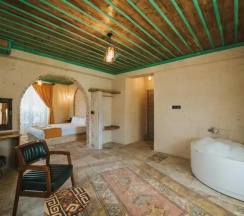 Двухместный люкс двуспальная кровать в La Casa Cave