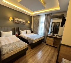 Четырёхместный номер Superior в Grand Seigneur Hotel