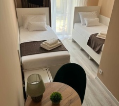 твин в Ларионов