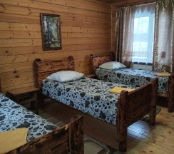 Коттедж стандарт с 1 односпальной и 1 двуспальной кроватью в Селигерский бережок