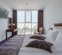 Стандарт улучшенный двухкомнатный в Marins Grand Hotel Астрахань