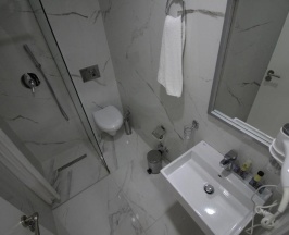 Трёхместный номер с балконом в Julia Hotel