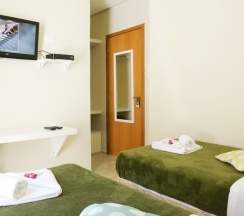 Двухместный люкс двуспальная кровать в Brazilodge All Suites Hostel