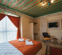 Двухместный люкс двуспальная кровать в La Casa Cave