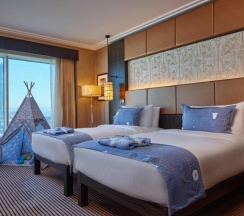 Люкс смежный с 2 комнатами в Hilton hotels & resorts