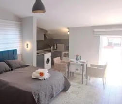 Двухместный люкс с террасой двуспальная кровать в Aspendos Suites