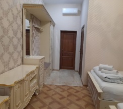 Стандартный четырехместный номер с 2 двуспальными кроватями в За рулем Юг