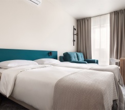 Семейный Супериор с 1 кроватью Queen-size или 2 односпальными кроватями 80х200см в Нега