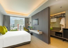 Номер Deluxe в Maitria Hotel Rama 9 Bangkok