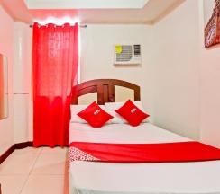 Четырёхместный семейный номер Standard 2 отдельные кровати в OYO 894 Cosmo Hotel P Campa Manila
