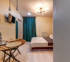 Комфортный номер-студия с удобствами и мини-кухней в Ecolife hotel