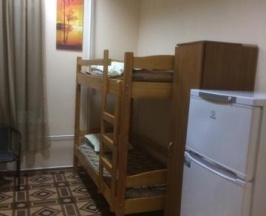 Кровать в 4-местном общем номере (без удобств, двухъярусные кровати) в Арал