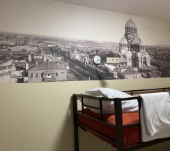 Кровать в 2-местном общем номере №2 в Стрежень