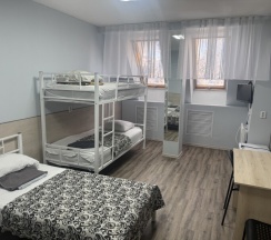 Четырехместный номер с общей ванной комнатой на мансарде №33 в Акспай