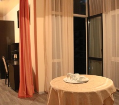 Номер люкс с 1 двуспальной кроватью в Триумф