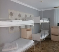 Кровать в общем номере в Раздолье