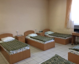 Кровать в общем номере в Мангазея
