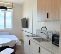 Уютная студия на 13 этаже с панорамным видом на Каспийское море. в Как Дома 05