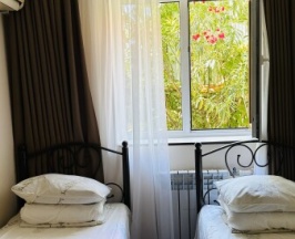 стандартный с двухместный номер с 2 односпальными кроватями в Гостевой дом