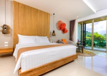 Двухместный номер Deluxe двуспальная кровать в Wyndham Grand Phuket Kalim Bay