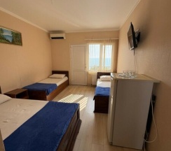 Четырёхместный стандарт с видом на море в Дежавю