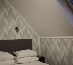 Номер стандарт с 1 двуспальной кроватью (мансарда) в Альпина