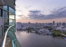 Двухместный люкс c 1 комнатой с видом на реку двуспальная кровать в Chatrium Hotel Riverside Bangkok