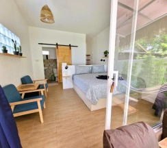 Двухместное бунгало Superior рядом с пляжем двуспальная кровать в Secret Beach Bungalows