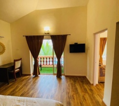 Двухместная вилла двуспальная кровать в Indismart Woodbourne Resort