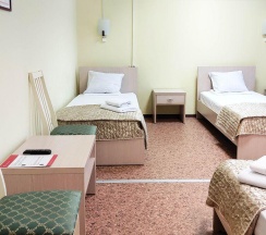 Кровать в 4-местном общем женском номере в Smart Hotel KDO Тюмень