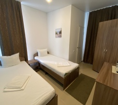 Стандартный номер с 2 отдельными кроватями  в White House